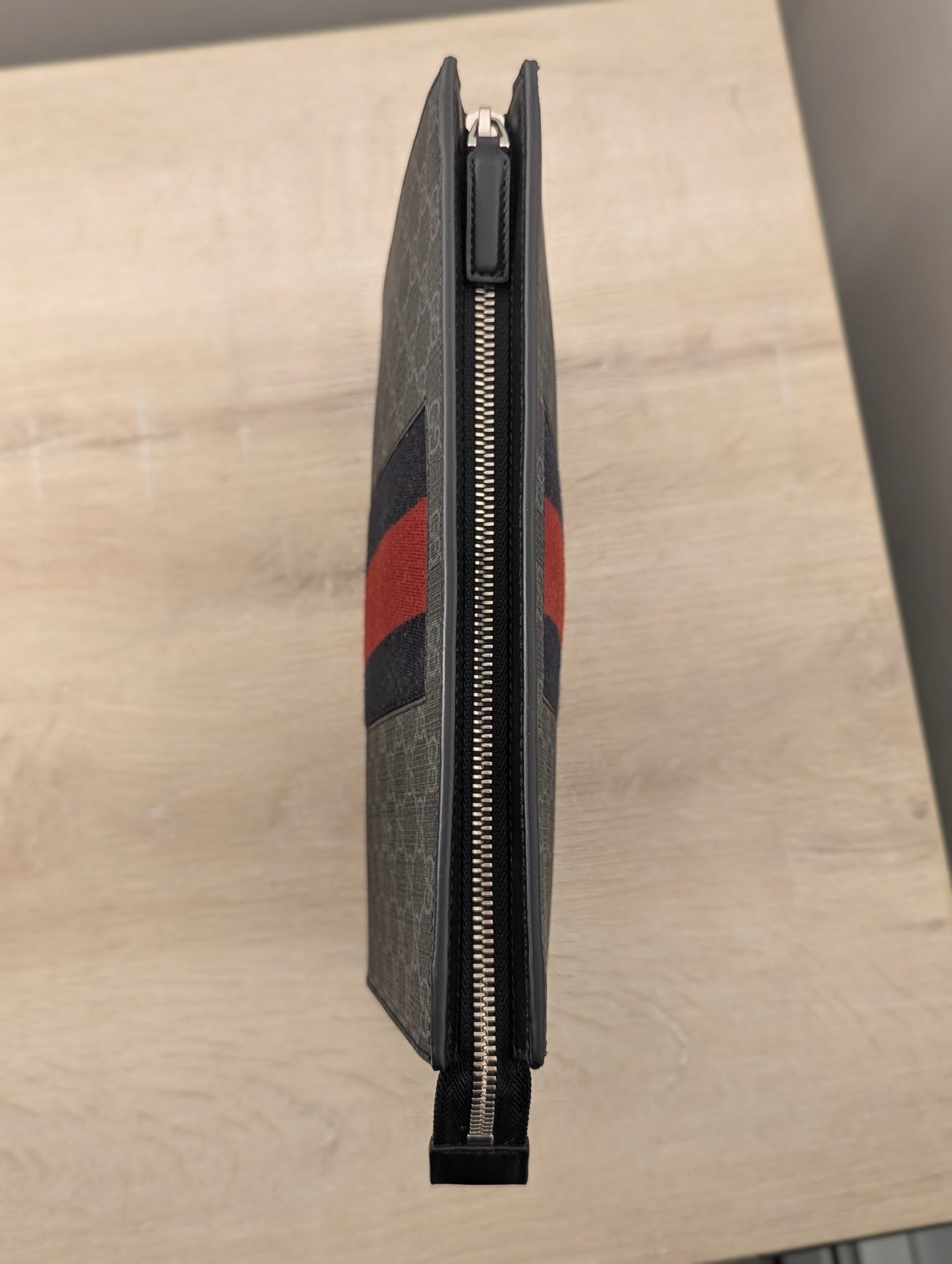 Gucci Supreme Clutch