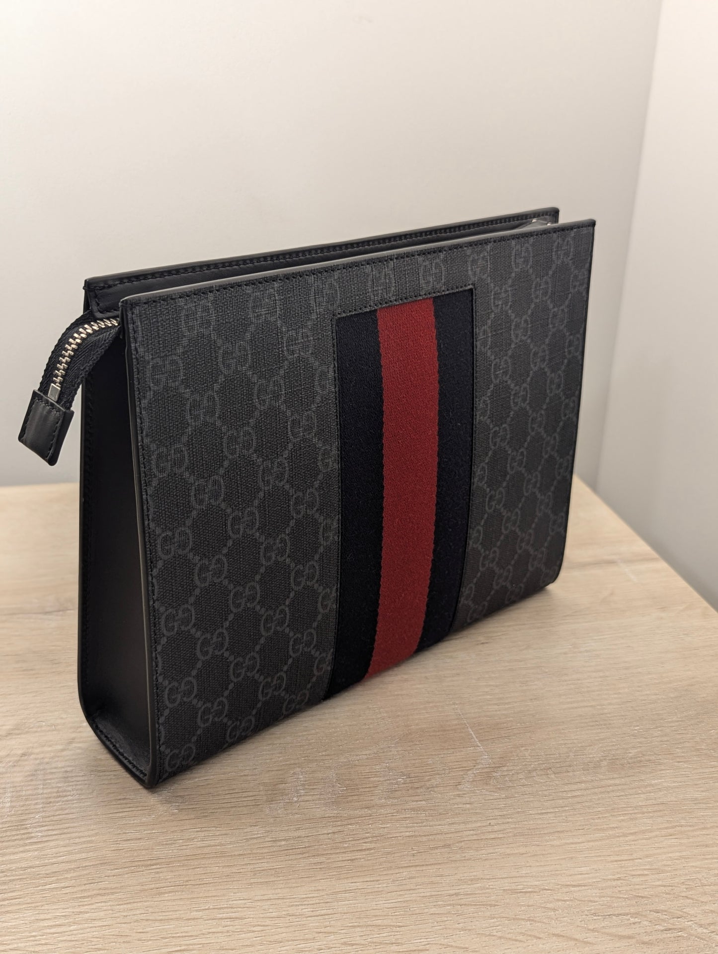 Gucci Supreme Clutch