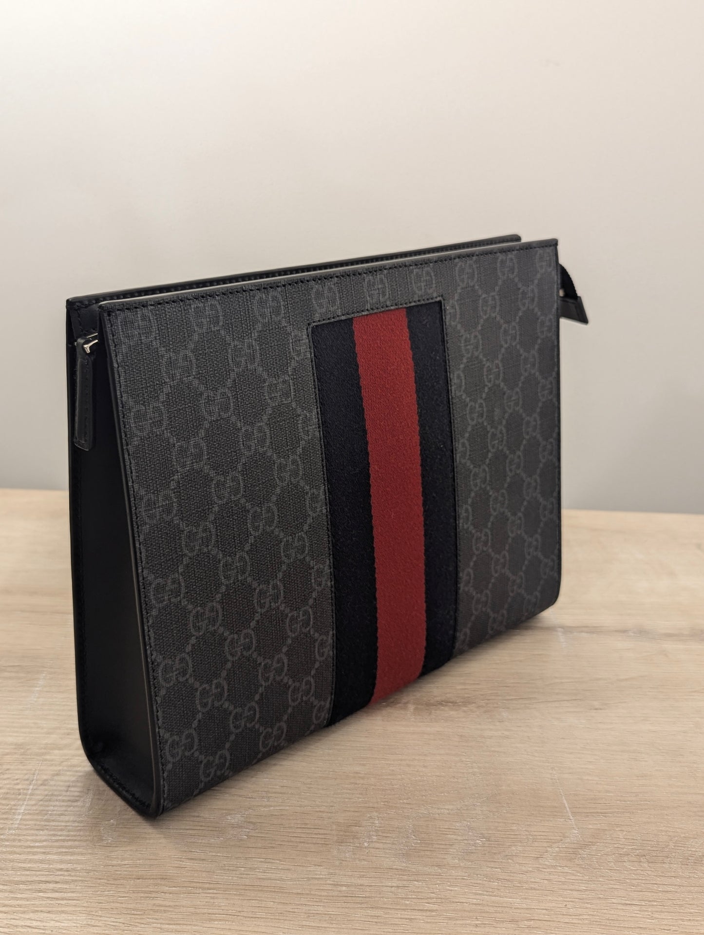 Gucci Supreme Clutch