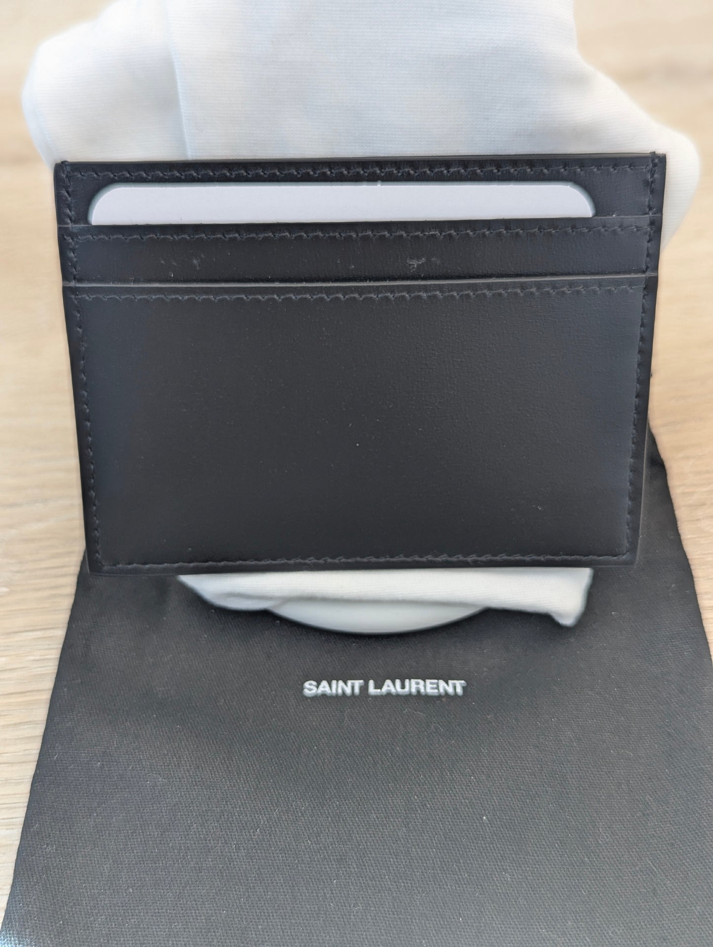 Saint Laurent Tiny Cassandre credit card case in shiny leather