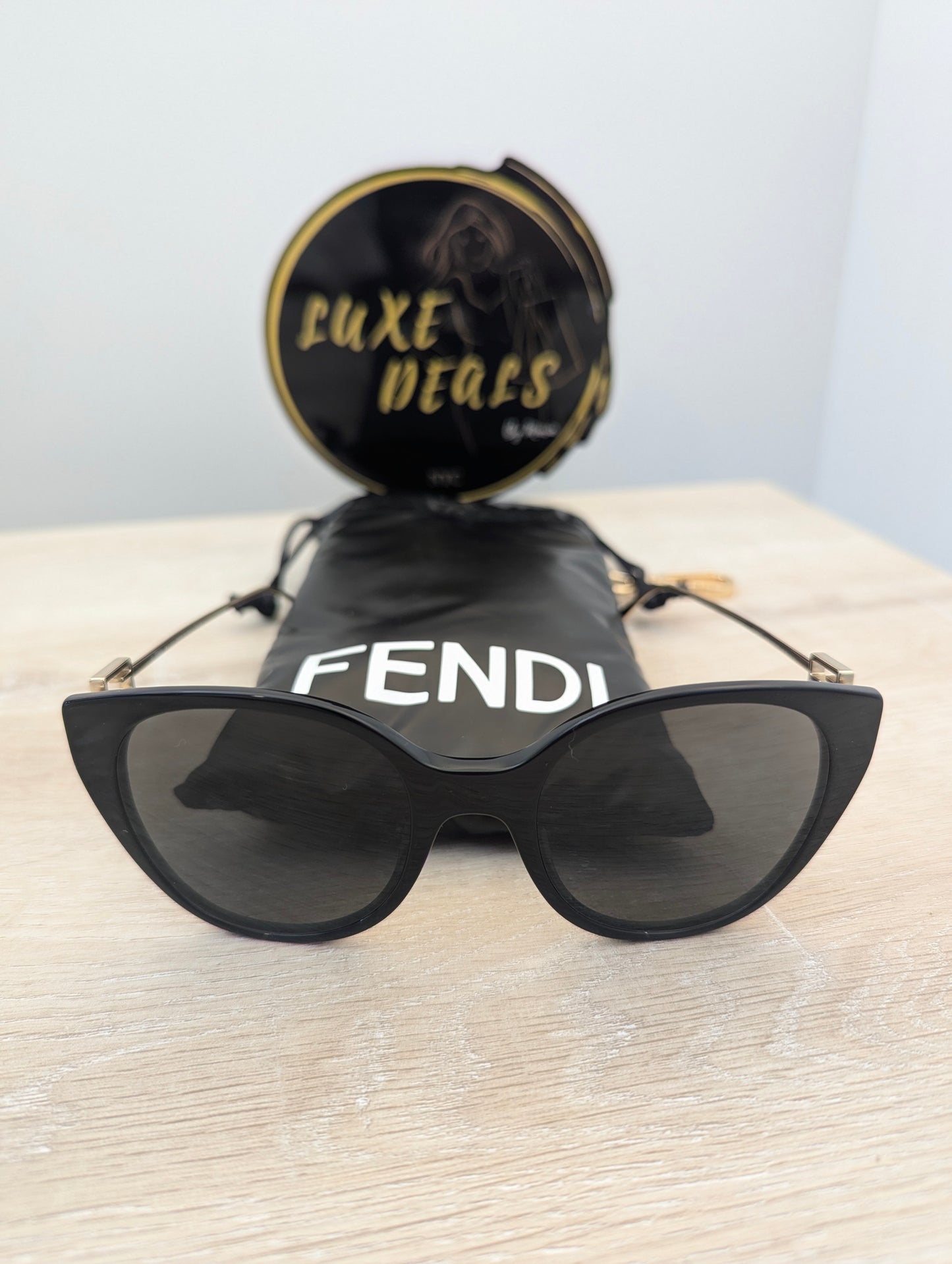 Fendi Cat Eye Sunglasses Black with Gold Accents and Sleeve