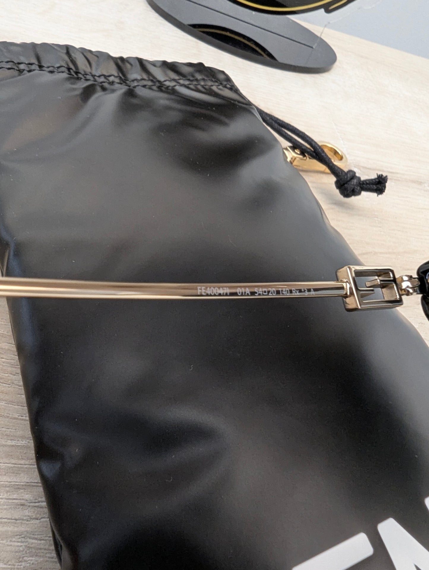 Fendi Cat Eye Sunglasses Black with Gold Accents and Sleeve