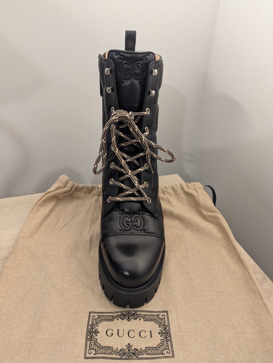 Gucci Embossed Signature Combat Boots